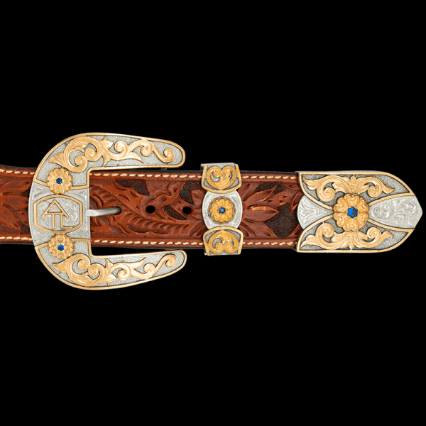 Our Alpine Three Piece Buckle Set highlights your ranch brand or initials in true western style! Crafted on dual hand engraved and matted silver base with golden Jeweler's Bronze scrollwork and custom ranch brand or initials. Order now!